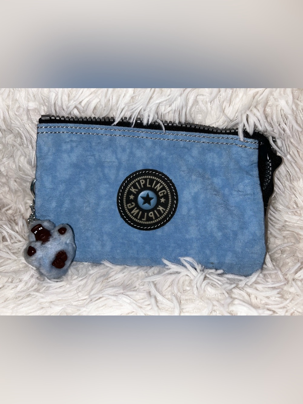 Kipling Light Blue Cosmetic Pouch with Round Logo Patch